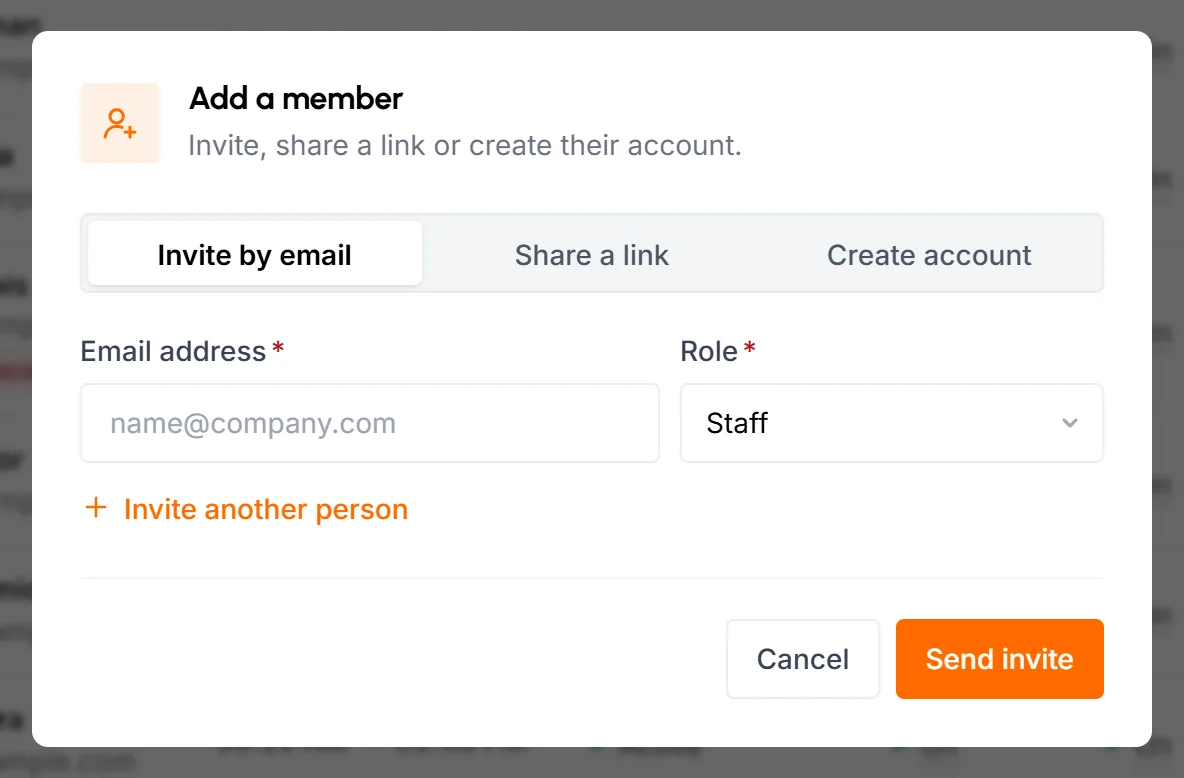 Add a member popup on the Invite by email tab, with Email address and Role fields and a Send invite button
